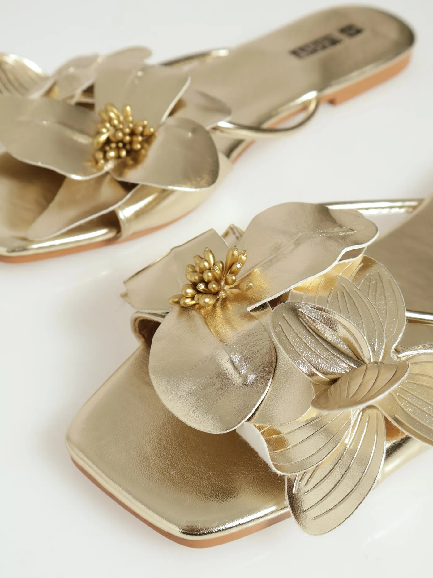 Flat One Strap Push In Mule With Flower Detail - Gold
